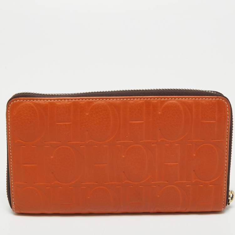 Pre Owned CH Carolina Herrera Orange Monogram Embossed Leather Zip Around Wallet