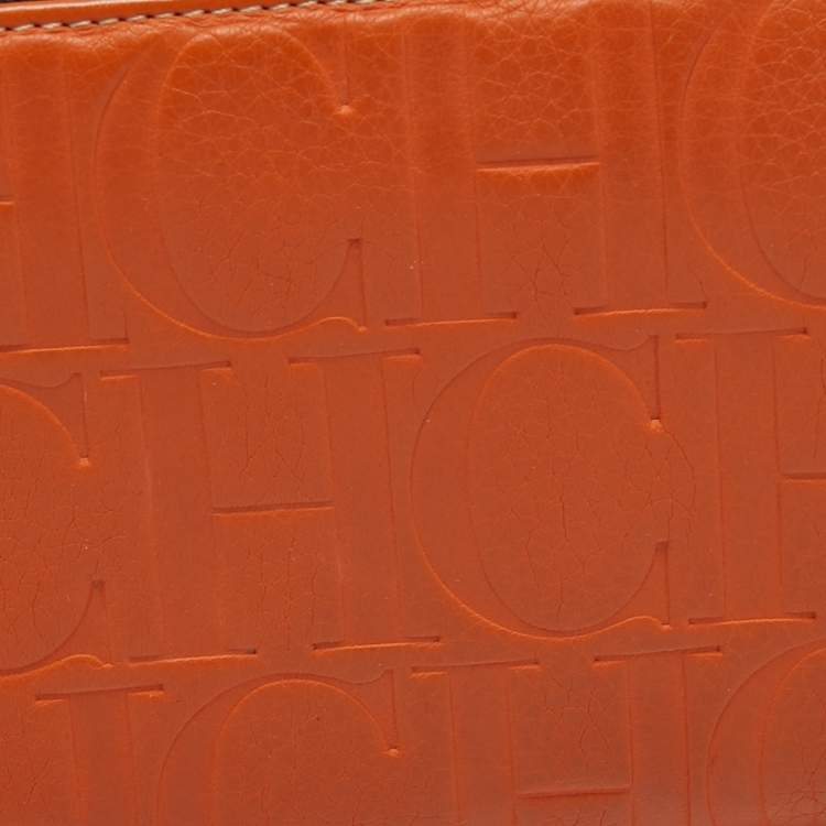 Pre Owned CH Carolina Herrera Orange Monogram Embossed Leather Zip Around Wallet