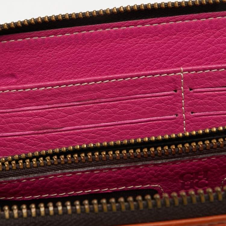 Pre Owned CH Carolina Herrera Orange Monogram Embossed Leather Zip Around Wallet