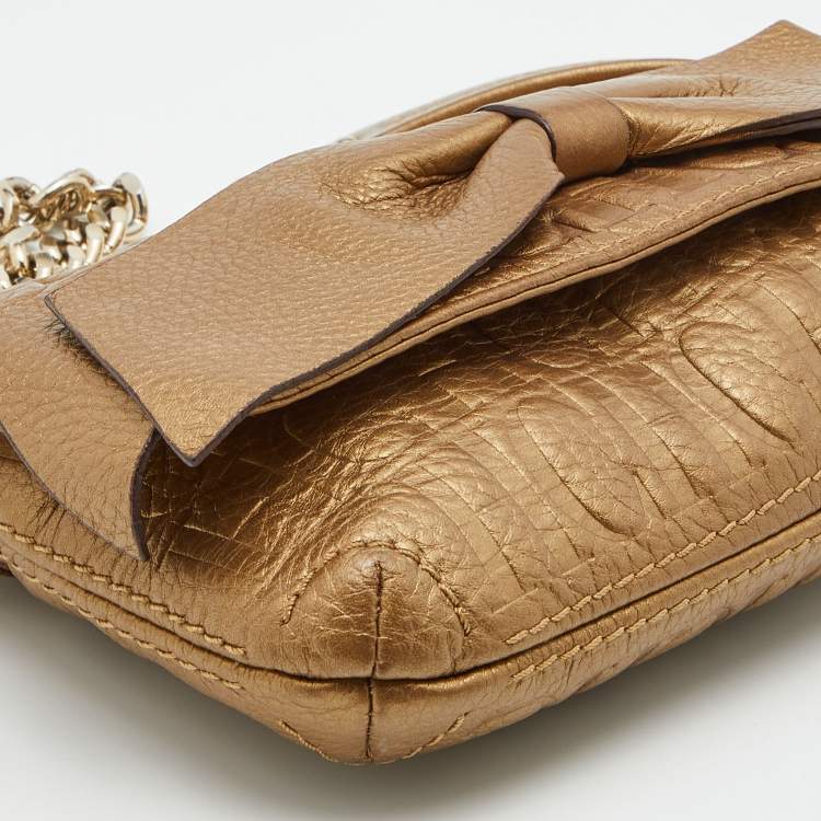 Pre Owned CH Carolina Herrera Metallic Monogram Embossed Leather Bow Shoulder Bag