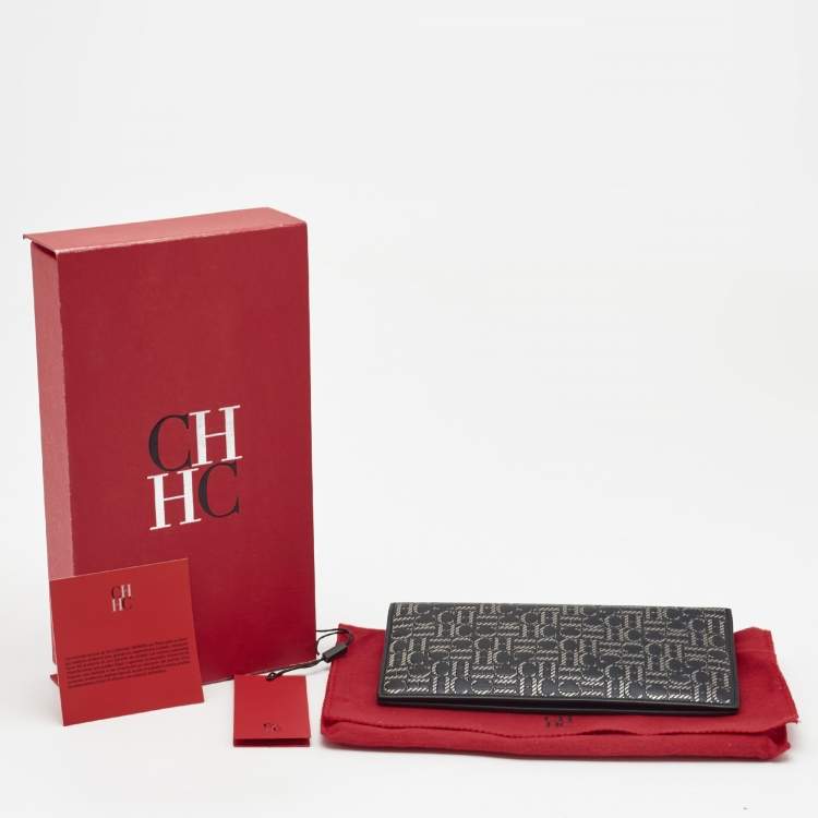 Pre Owned CH Carolina Herrera Black/Silver Embossed Leather Bifold Continental Wallet