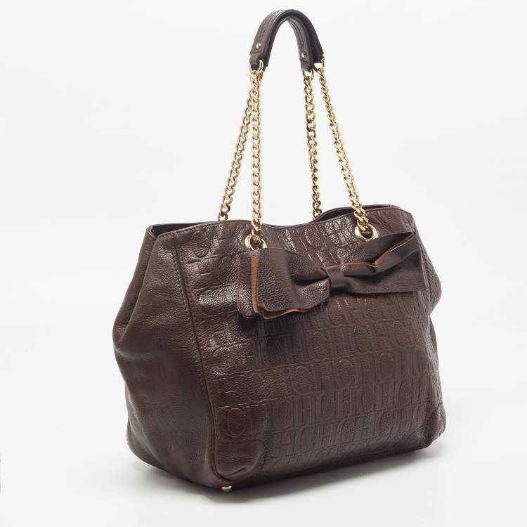 Pre Owned CH Carolina Herrera Brown Monogram Embossed Leather Bow New Anna Hobo