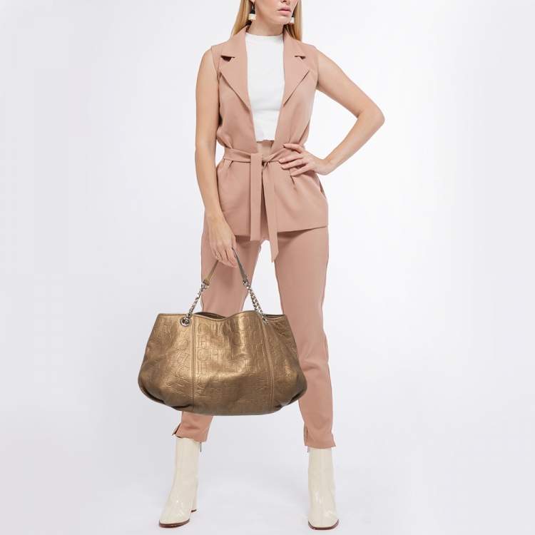 Pre Owned CH Carolina Herrera Gold Monogram Embossed Leather Dahlia Hobo