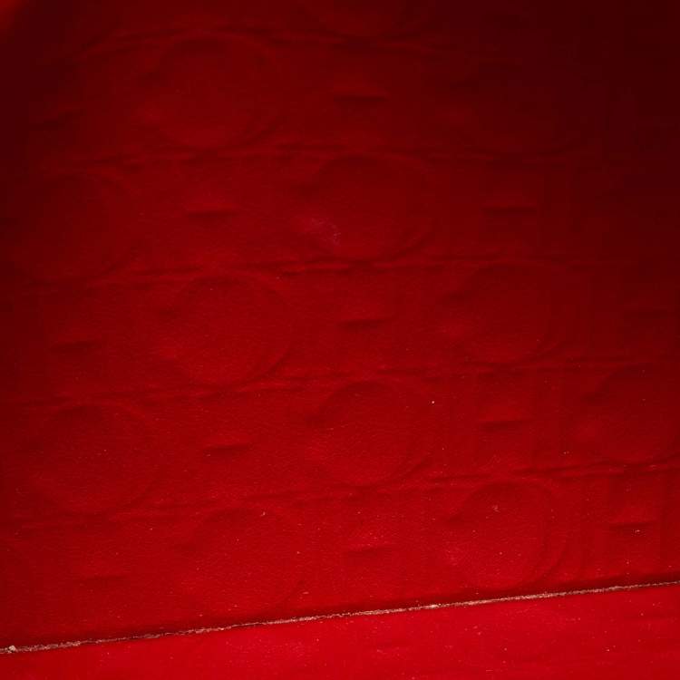 Pre Owned CH Carolina Herrera Red Monogram Embossed Leather Zip Wristlet Pouch