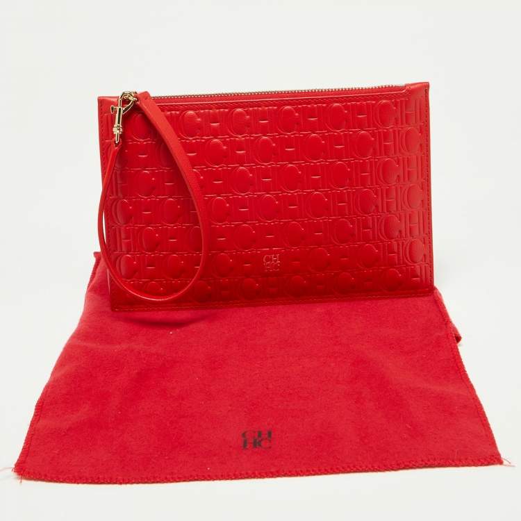 Pre Owned CH Carolina Herrera Red Monogram Embossed Leather Zip Wristlet Pouch