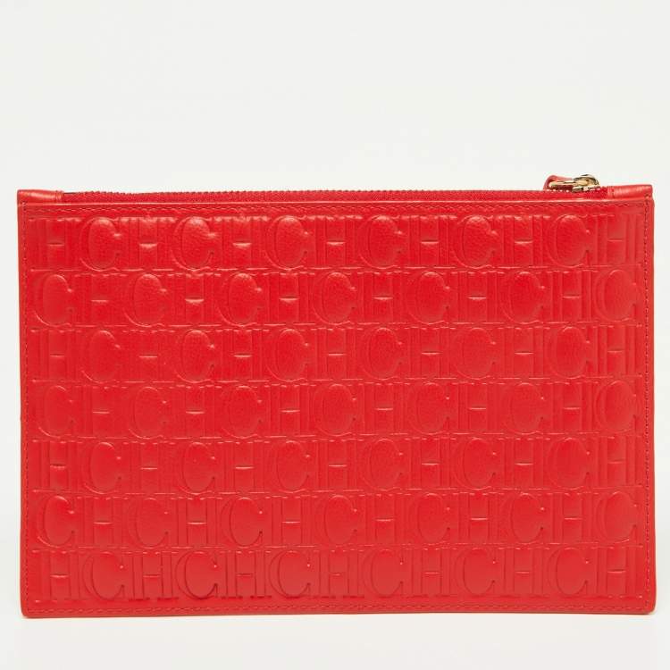 Pre Owned CH Carolina Herrera Red Monogram Embossed Leather Zip Wristlet Pouch