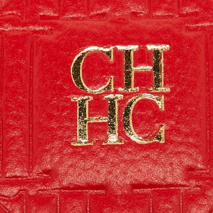 Pre Owned CH Carolina Herrera Red Monogram Embossed Leather Zip Wristlet Pouch