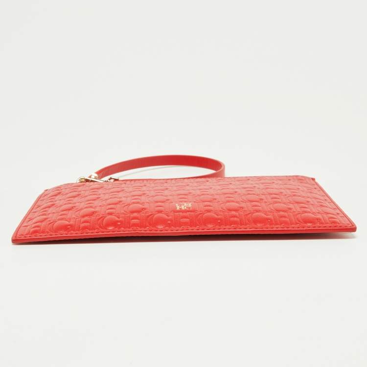 Pre Owned CH Carolina Herrera Red Monogram Embossed Leather Zip Wristlet Pouch