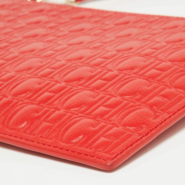 Pre Owned CH Carolina Herrera Red Monogram Embossed Leather Zip Wristlet Pouch