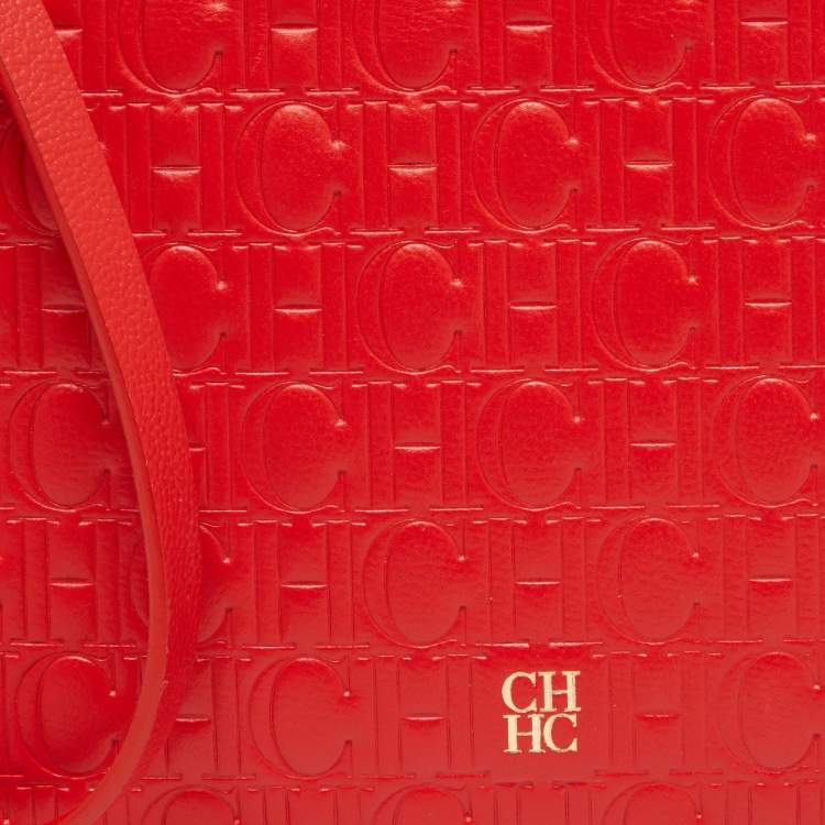 Pre Owned CH Carolina Herrera Red Monogram Embossed Leather Zip Wristlet Pouch
