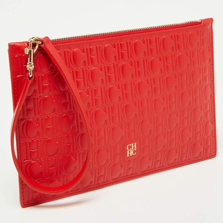 Pre Owned CH Carolina Herrera Red Monogram Embossed Leather Zip Wristlet Pouch