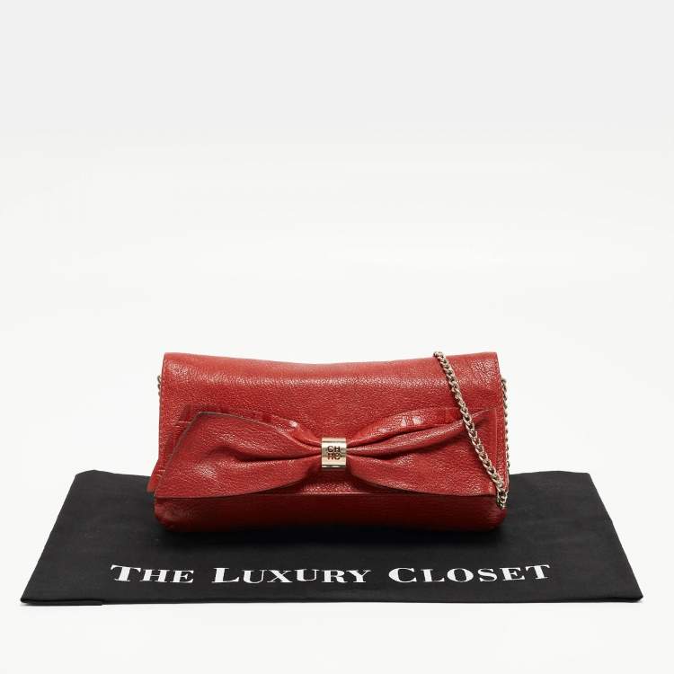 Pre Owned CH Carolina Herrera Red Monogram Leather Bow Chain Clutch