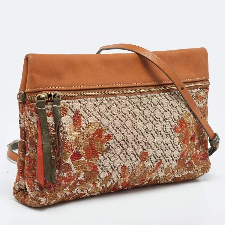 Pre Owned CH Carolina Herrera Brown Signature Canvas and Leather Strap Clutch 