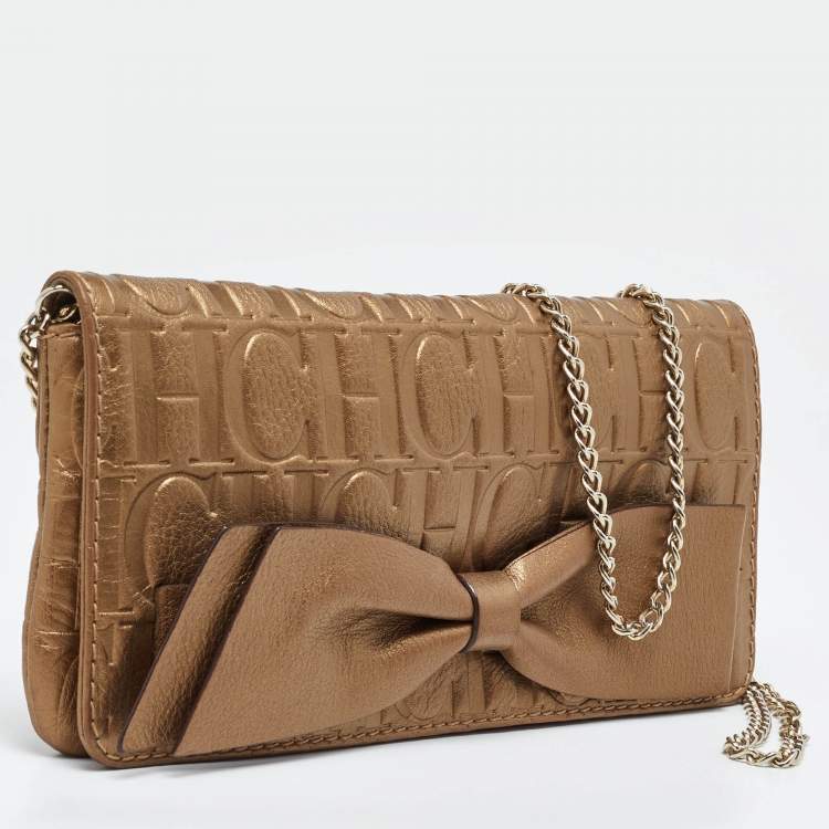 Pre Owned CH Carolina Herrera Gold Monogram Leather Bow Chain Clutch