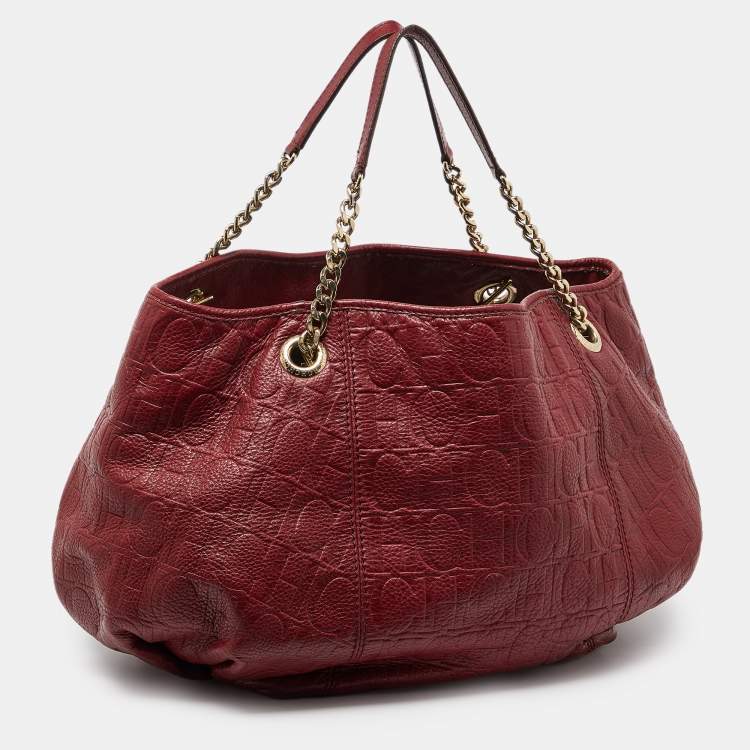 Pre Owned CH Carolina Herrera Red Monogram Embossed Leather Chain Hobo