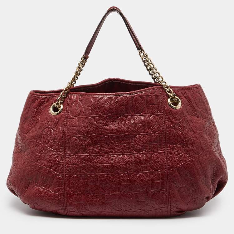 Pre Owned CH Carolina Herrera Red Monogram Embossed Leather Chain Hobo