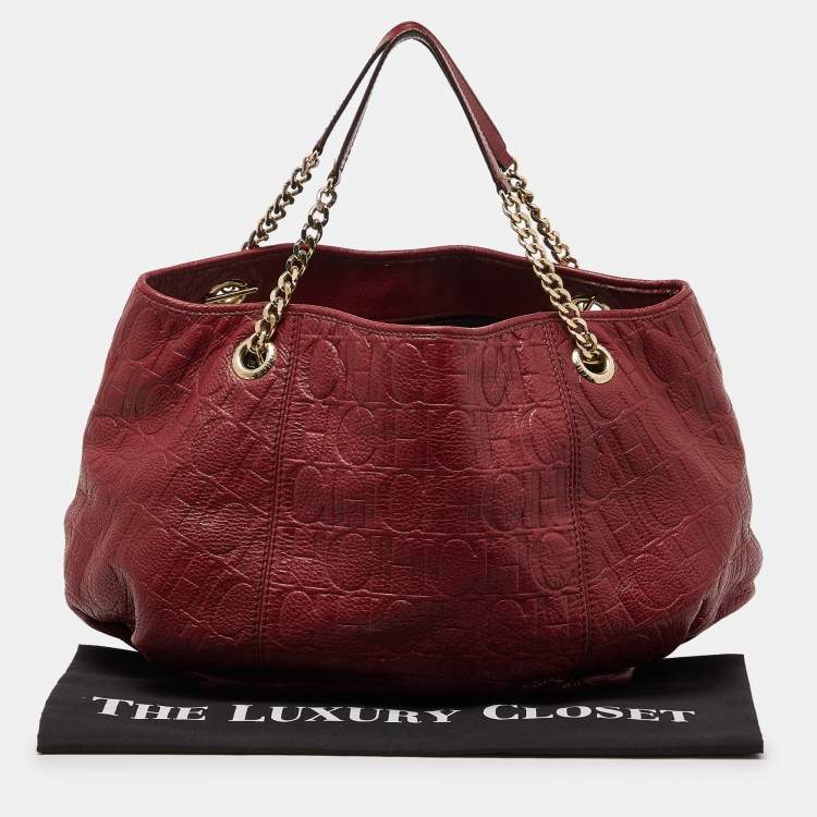 Pre Owned CH Carolina Herrera Red Monogram Embossed Leather Chain Hobo