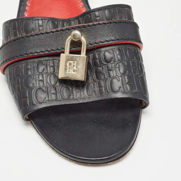 Pre Owned CH Carolina Herrera Black Monogram Embossed Leather Matryoshka Locked Slide Sandals Size 38