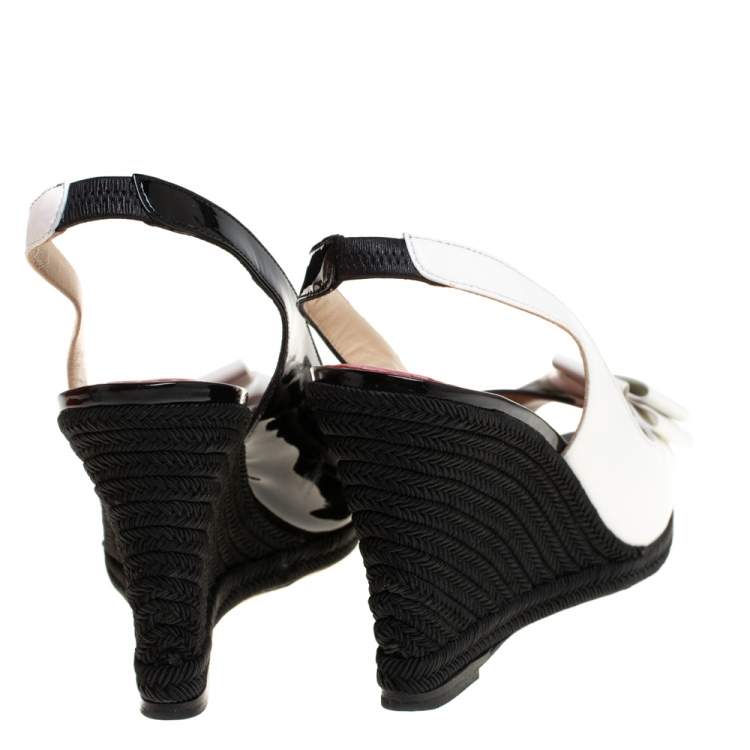 Pre Owned Carolina Herrera Black/White Leather and Patent Leather Peep Toe Bow Espadrille Wedge Sandals Size 38