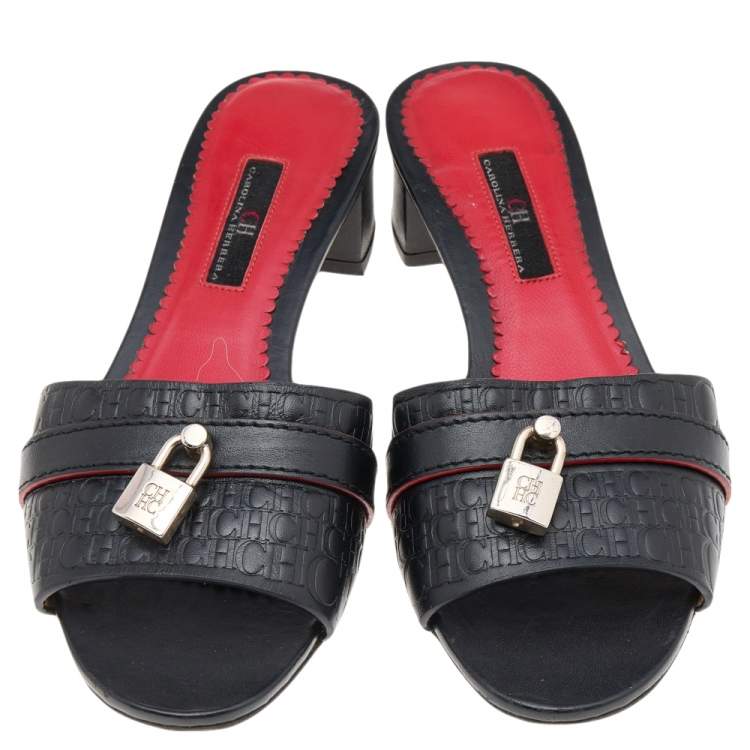 Pre Owned CH Carolina Herrera Monogram Embossed Leather Traveller Locked Slide Sandals Size 37