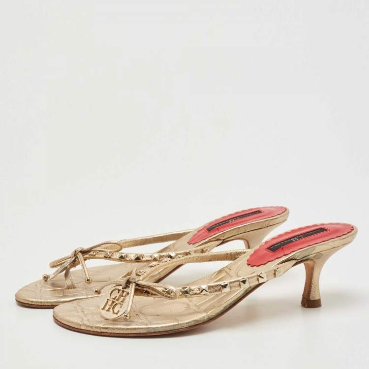Pre Owned CH Carolina Herrera Gold Studded Leather Bow Logo Charm Thong Sandals Size 36