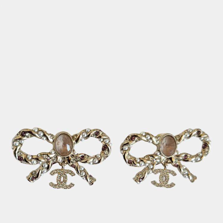 Pre Owned Chanel twisted metal bow earrings