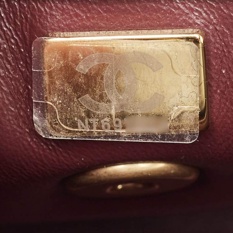 Pre Owned Chanel Black Quilted Leather Mini Symbolic Coco Top Handle Bag