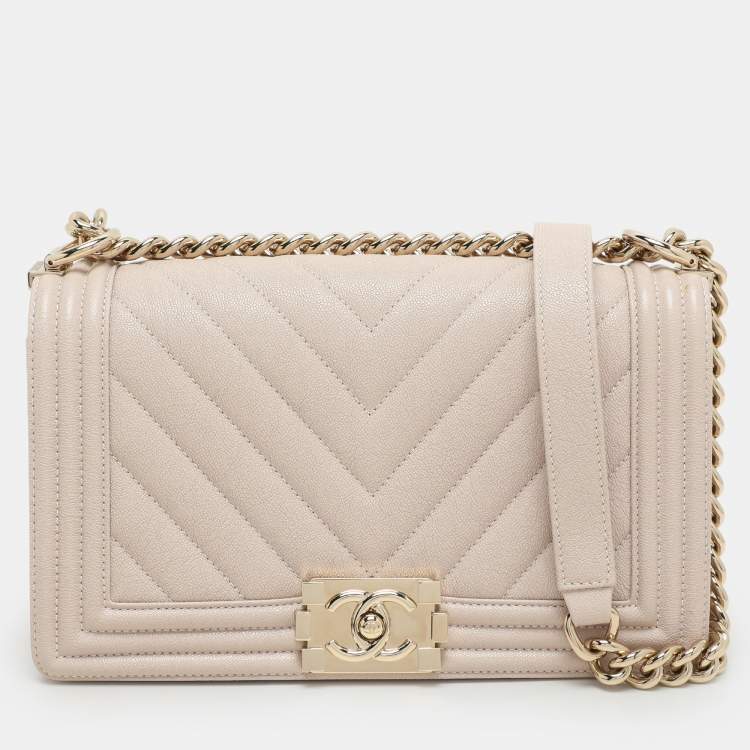 Pre Owned Chanel Beige Chevron Quilted Soft Caviar Leather Medium Boy Flap Bag