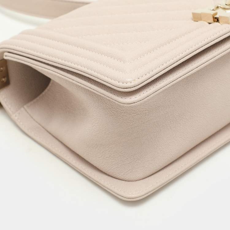 Pre Owned Chanel Beige Chevron Quilted Soft Caviar Leather Medium Boy Flap Bag