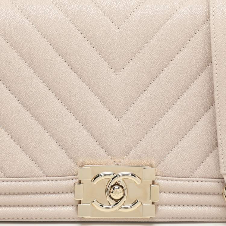 Pre Owned Chanel Beige Chevron Quilted Soft Caviar Leather Medium Boy Flap Bag