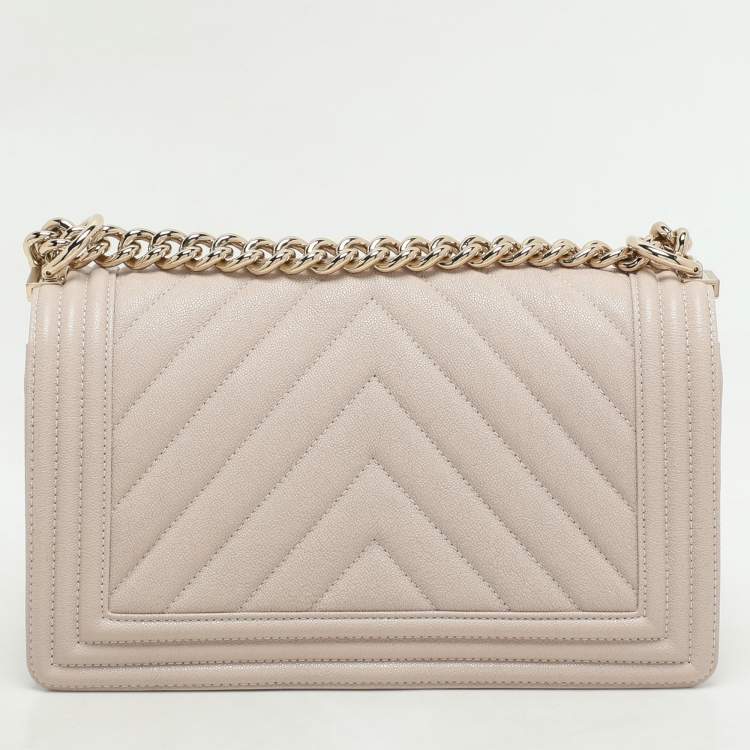 Pre Owned Chanel Beige Chevron Quilted Soft Caviar Leather Medium Boy Flap Bag