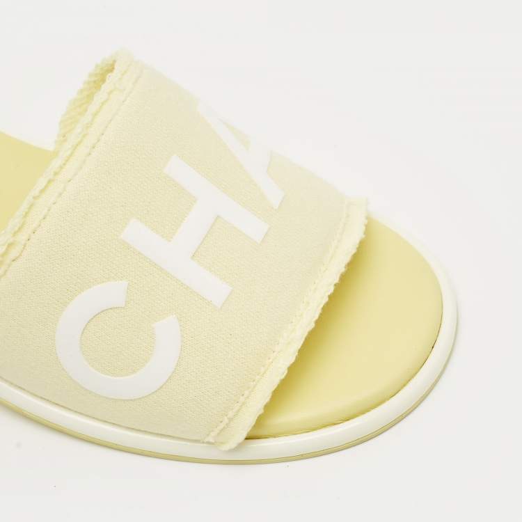Pre Owned Chanel Yellow/White Fabric Logo Slide Sandals Size 38.5