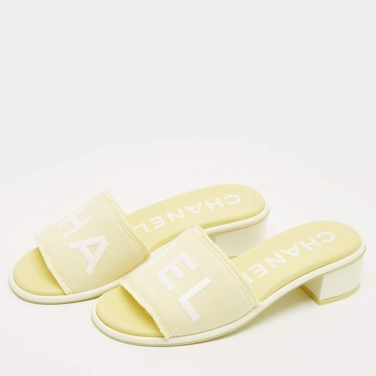 Pre Owned Chanel Yellow/White Fabric Logo Slide Sandals Size 38.5