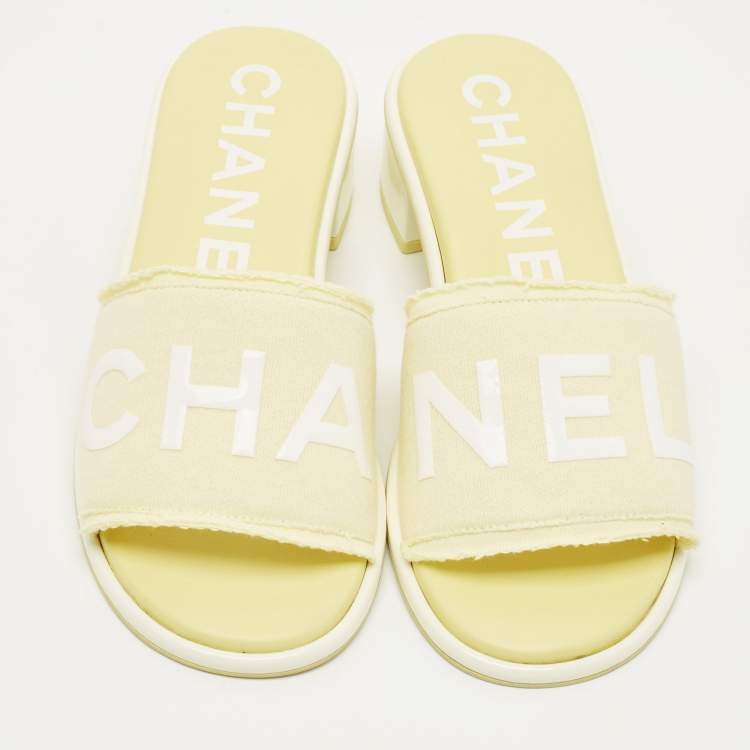 Pre Owned Chanel Yellow/White Fabric Logo Slide Sandals Size 38.5