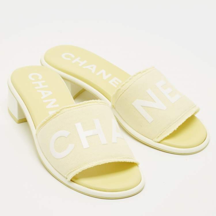Pre Owned Chanel Yellow/White Fabric Logo Slide Sandals Size 38.5