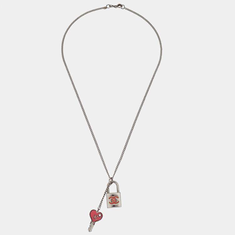 Pre Owned Chanel Padlock Key Pendant Necklace Silver Pink