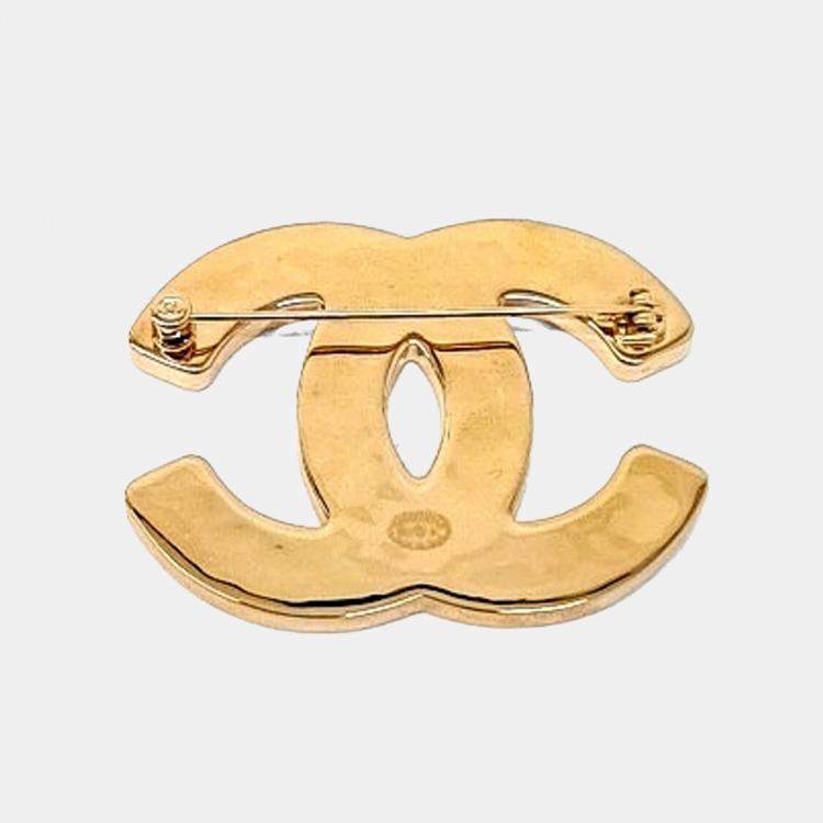 Pre Owned Chanel Metal logo brooch