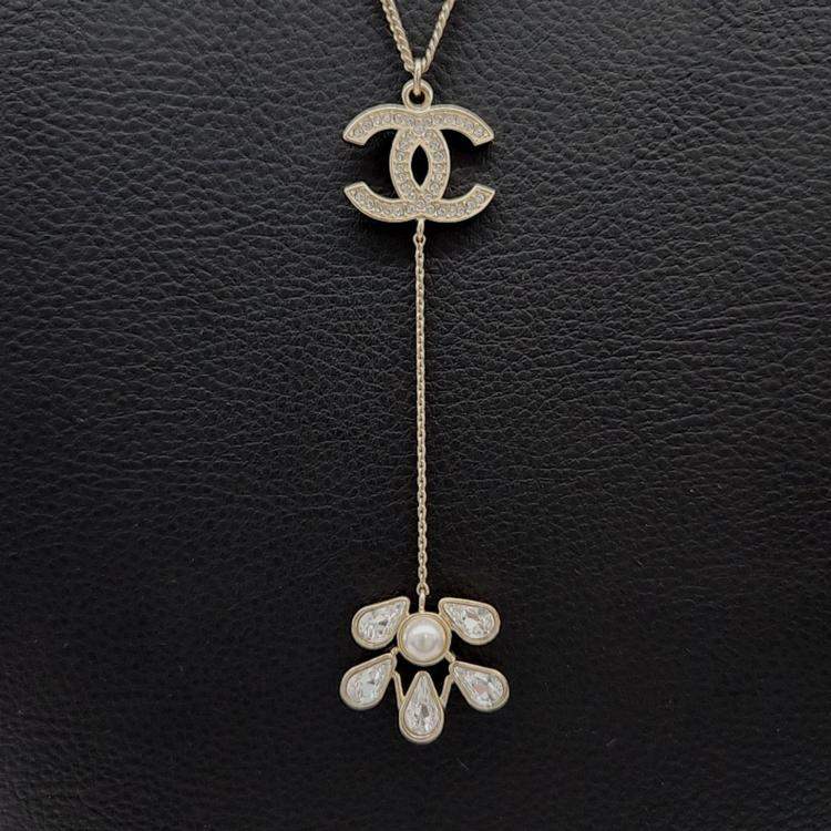 Pre Owned Chanel Gold Plated Pearl Crystal Logo Necklace