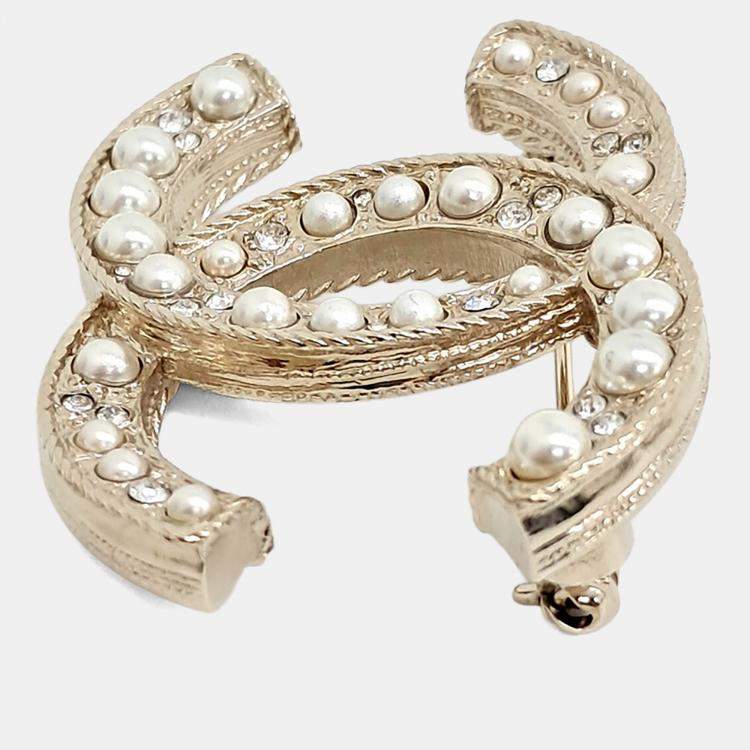Pre Owned Chanel logo brooch