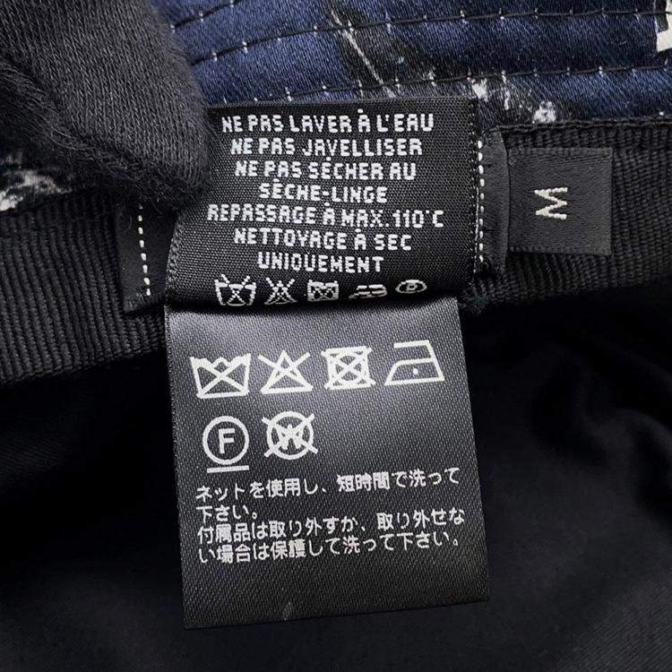 Pre Owned Chanel Camellia Bucket Hat Size M Black/White Cotton 100%