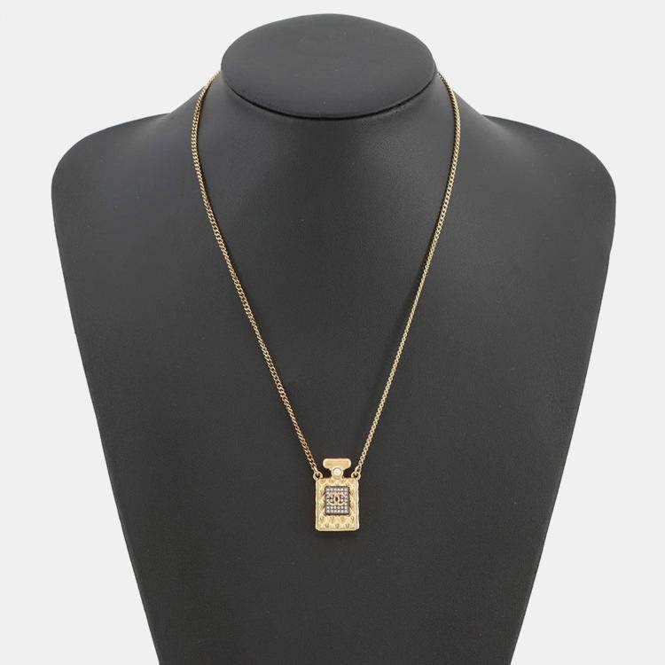 Pre Owned Chanel Cc Logo Perfume Bottle Motif Necklace Gold Plated Rhinestone Faux Pearl
