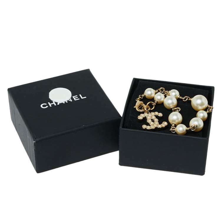 Pre Owned Chanel Gold Tone Metal Faux Pearl CC Logo Charm Bracelet