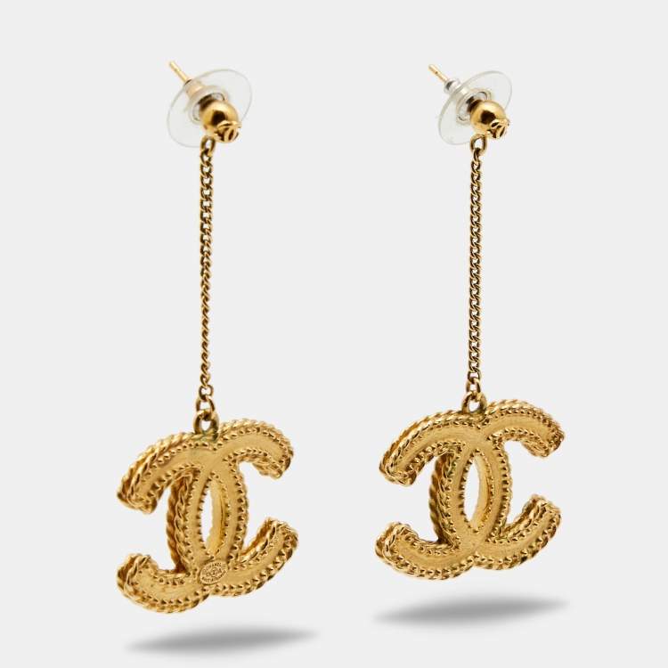 CHANEL CC Gold Metal Textured Nugget Logo Evening Dangle Drop Earrings For  Sale at 1stDibs  chanel gold earrings chanel drop earrings gold chanel  dangle earrings