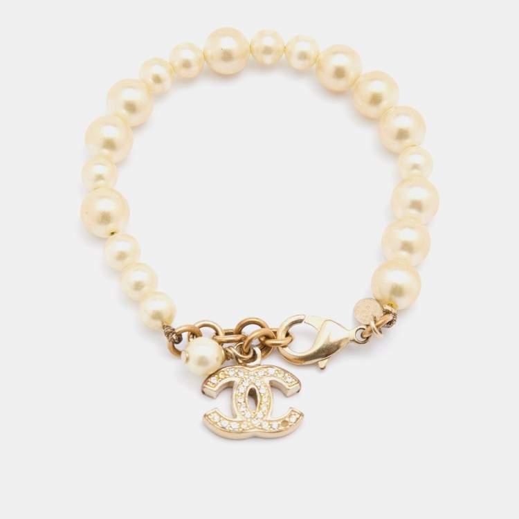 Chanel Gold Camellia and Faux Pearl Bracelet For Sale at 1stDibs  fake  pearl bracelet, faux chanel bracelet, chanel bracelet with pearls