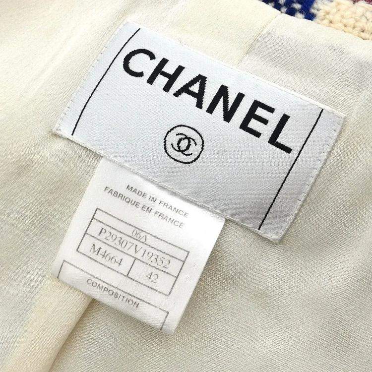 Pre Owned معطف شانيل دافيل أبيض رقم 42
