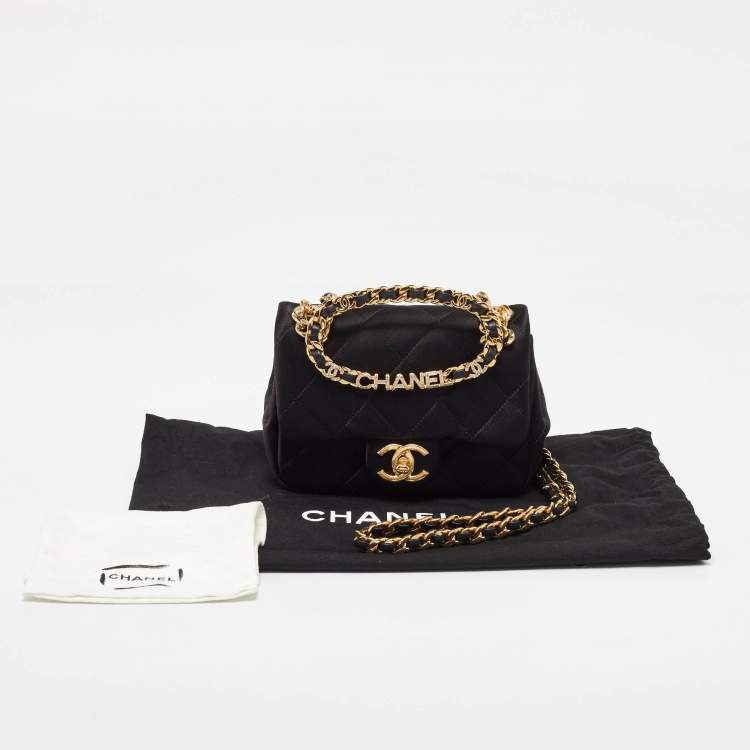 Pre Owned Chanel Black Quilted Satin Top Handle Flap Bag