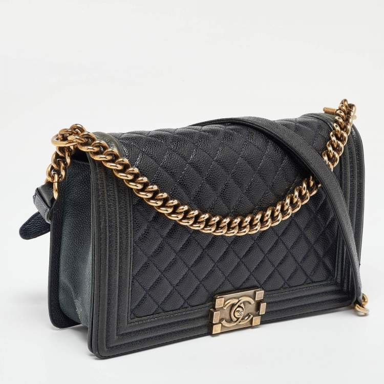 Pre Owned Chanel Navy Blue Quilted Caviar Leather New Medium Boy Flap Bag