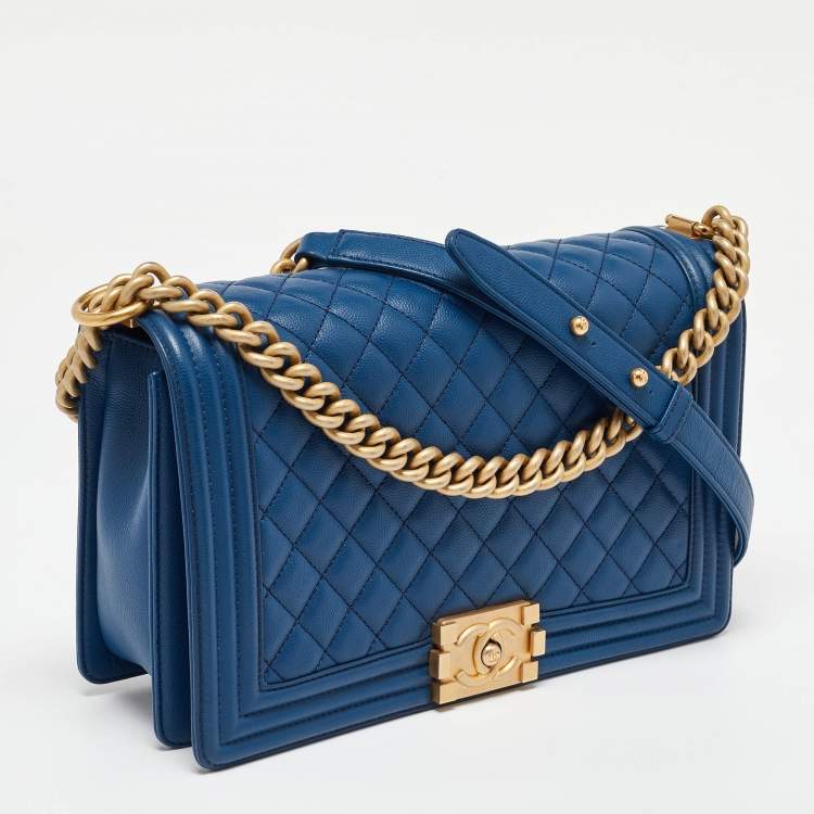 Pre Owned Chanel Blue Quilted Caviar Leather New Medium Boy Flap Bag
