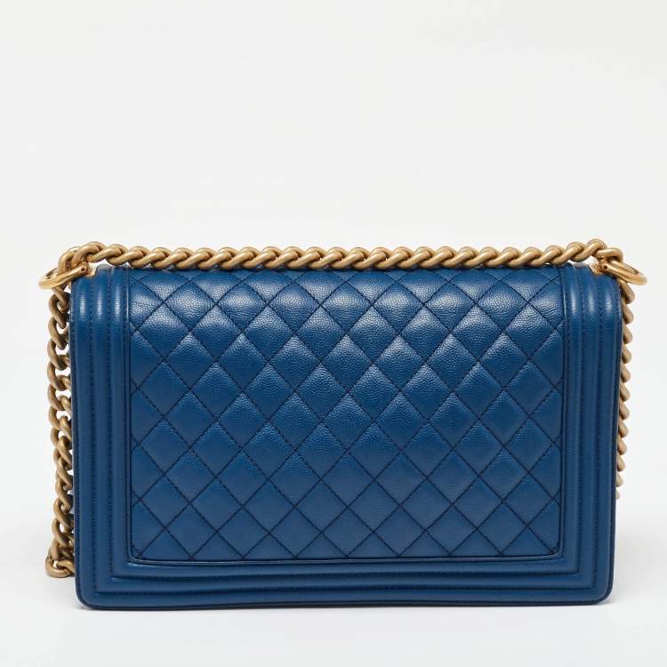 Pre Owned Chanel Blue Quilted Caviar Leather New Medium Boy Flap Bag