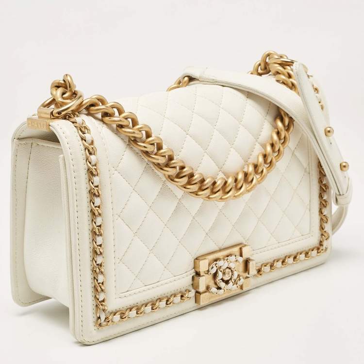 Pre Owned Chanel Off White Quilted Caviar Leather Medium Chain Around Boy Flap Bag